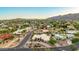 Wide aerial shot of a beautiful neighborhood with desert landscaping and mountain views at 3733 E Kachina Dr, Phoenix, AZ 85044