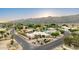 Beautiful aerial view of a desert home on a corner lot, surrounded by mature trees and landscaping at 3733 E Kachina Dr, Phoenix, AZ 85044