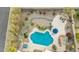 An overhead view of an outdoor space with pool, seating, outdoor kitchen and beautiful landscaping at 3733 E Kachina Dr, Phoenix, AZ 85044