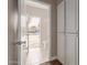 Bathroom featuring access to the outdoor pool, and a convenient door for pool access at 3733 E Kachina Dr, Phoenix, AZ 85044