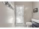 Bathroom features a convenient door with access to the outside, along with a charming coat rack at 3733 E Kachina Dr, Phoenix, AZ 85044
