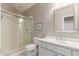 Clean bathroom featuring glass shower doors, white vanity and sink, and tile floors at 3733 E Kachina Dr, Phoenix, AZ 85044