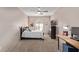 Comfortable bedroom featuring a ceiling fan, plush carpet, and bright window at 3733 E Kachina Dr, Phoenix, AZ 85044