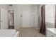 Bright bedroom with neutral decor, closet with sliding doors, and plush carpet at 3733 E Kachina Dr, Phoenix, AZ 85044