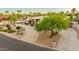 An upscale residence boasts an impeccably manicured yard, complemented by a circular driveway at 3733 E Kachina Dr, Phoenix, AZ 85044