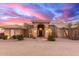 Stately single-story home featuring tiled roof and arched entryway at 3733 E Kachina Dr, Phoenix, AZ 85044