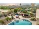 Relaxing pool area with outdoor kitchen and seating, perfect for entertaining with mountain views at 3733 E Kachina Dr, Phoenix, AZ 85044