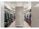 Large walk-in closet featuring built-in shelving for ample storage at 3733 E Kachina Dr, Phoenix, AZ 85044