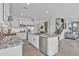 Spacious kitchen with white cabinetry, center island, stainless appliances, and modern countertops at 3750 E Rochelle Cir, Mesa, AZ 85215