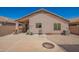 View of a backyard featuring a covered patio, seating, grill, and well-maintained landscaping at 38662 N La Grange Ln, San Tan Valley, AZ 85140