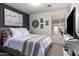 Inviting bedroom with neutral tones, decorative wall art, and a comfortable bed setting at 38662 N La Grange Ln, San Tan Valley, AZ 85140