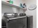 Modern laundry room with a front-load washer and dryer, offering convenience and efficiency at 38662 N La Grange Ln, San Tan Valley, AZ 85140