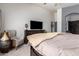 Bright, spacious main bedroom with a TV and relaxing sitting area at 38662 N La Grange Ln, San Tan Valley, AZ 85140