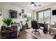 Inviting home office space with natural light, sports memorabilia, and a functional desk area at 38662 N La Grange Ln, San Tan Valley, AZ 85140