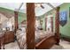 Unique bedroom features decorative canopy bed, side tables, and overhead fan at 43036 W Anne Ln, Maricopa, AZ 85138