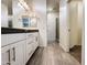 Bathroom with double vanity, modern fixtures, and tile flooring, with walk in shower at 4440 S Leisure Way, Gilbert, AZ 85297