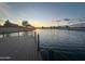 Community dock overlooking the lake offers serene views of the water and stunning sunset at 4440 S Leisure Way, Gilbert, AZ 85297