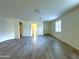 Bright, open-concept living room with tile floors and lots of natural light from windows at 4440 S Leisure Way, Gilbert, AZ 85297