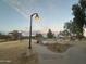 Community park featuring a playground, walking paths, benches, and beautiful landscaping at 4440 S Leisure Way, Gilbert, AZ 85297