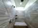 Modern shower with stylish tile, built in bench and dual shower heads at 4440 S Leisure Way, Gilbert, AZ 85297
