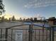 A community splash pad features colorful play equipment and water features for Gathering fun at 4440 S Leisure Way, Gilbert, AZ 85297