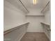 Walk-in closet with shelving at 4544 E Campo Bello Dr, Phoenix, AZ 85032