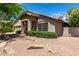 Charming single-story home featuring well-maintained desert landscaping and a tile roof at 4544 E Campo Bello Dr, Phoenix, AZ 85032
