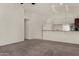 Open living room features a breakfast bar and an open floor plan at 4544 E Campo Bello Dr, Phoenix, AZ 85032