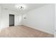 Bedroom featuring carpet, contemporary lighting, and closet at 4922 W Coolidge St, Phoenix, AZ 85031