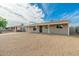 Charming home featuring a covered porch and neutral color palette in a neighborhood setting at 4922 W Coolidge St, Phoenix, AZ 85031