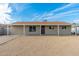 Classic home with covered front porch, offering curb appeal and inviting entry at 4922 W Coolidge St, Phoenix, AZ 85031