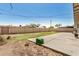 Backyard featuring brick walls, some grass and a small area of dirt at 5159 W Vernon Ave, Phoenix, AZ 85035