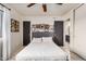 Inviting bedroom showcasing a comfortable queen bed with closet and ensuite access at 5159 W Vernon Ave, Phoenix, AZ 85035