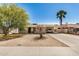 Inviting single-story home with a low maintenance desert landscaped front yard and covered parking at 5159 W Vernon Ave, Phoenix, AZ 85035