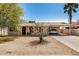 Charming single-story home with a desert landscaped front yard and covered parking at 5159 W Vernon Ave, Phoenix, AZ 85035