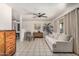 Open-concept living area with tile flooring, ceiling fan and plenty of space at 5159 W Vernon Ave, Phoenix, AZ 85035