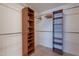 Walk-in closet with custom shelving, providing ample storage space at 5539 E Dahlia Dr, Scottsdale, AZ 85254