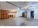 Spacious garage with plenty of storage cabinets and shelving at 5539 E Dahlia Dr, Scottsdale, AZ 85254