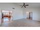 Open-concept living room showcases tile flooring and seamless access to the kitchen area at 5539 E Dahlia Dr, Scottsdale, AZ 85254