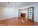 Living room showcasing hardwood floors and french doors leading to another room at 5539 E Dahlia Dr, Scottsdale, AZ 85254