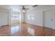 Spacious main bedroom with ceiling fan and lots of natural light at 5539 E Dahlia Dr, Scottsdale, AZ 85254