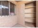 Patio with security bars on window and a storage closet at 6902 W Devonshire Ave # 1280, Phoenix, AZ 85033