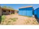 View of backyard with blue shed and covered patio at 717 W Chilton St, Chandler, AZ 85225
