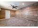 This versatile bonus room offers a unique accent wall, carpet, and great lighting, perfect for relaxation at 717 W Chilton St, Chandler, AZ 85225