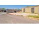 View of the detached garage with cement driveway at 717 W Chilton St, Chandler, AZ 85225