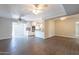 Spacious, bright living room featuring ceiling fans and an open layout at 717 W Chilton St, Chandler, AZ 85225