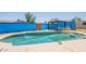 Backyard swimming pool with gazebo and surrounding hardscape at 717 W Chilton St, Chandler, AZ 85225