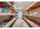 The basement features open storage shelves, ideal for organizing tools, equipment, and supplies at 717 W Chilton St, Chandler, AZ 85225
