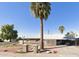 Charming single-story home featuring desert landscaping and a spacious carport at 7202 N 36Th Ave, Phoenix, AZ 85051