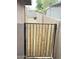 Newly built gate inside of backyard leading to alley in backyard with block fence at 7202 N 36Th Ave, Phoenix, AZ 85051